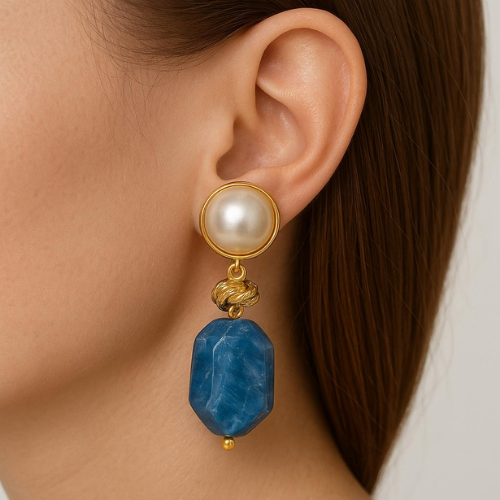 Luxurious earrings with an artistic design and colored stones