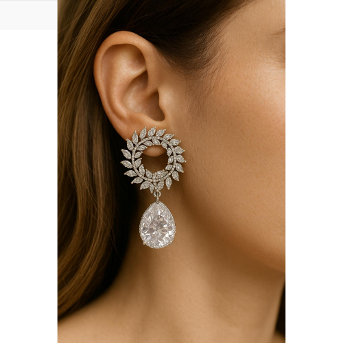 Luxurious circular studded earring with a brilliant teardrop cubic zirconia
