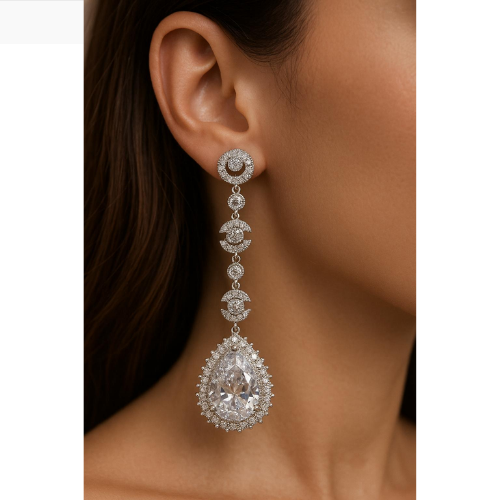 Luxurious drop earrings embellished with zircon and a large pear-shaped stone