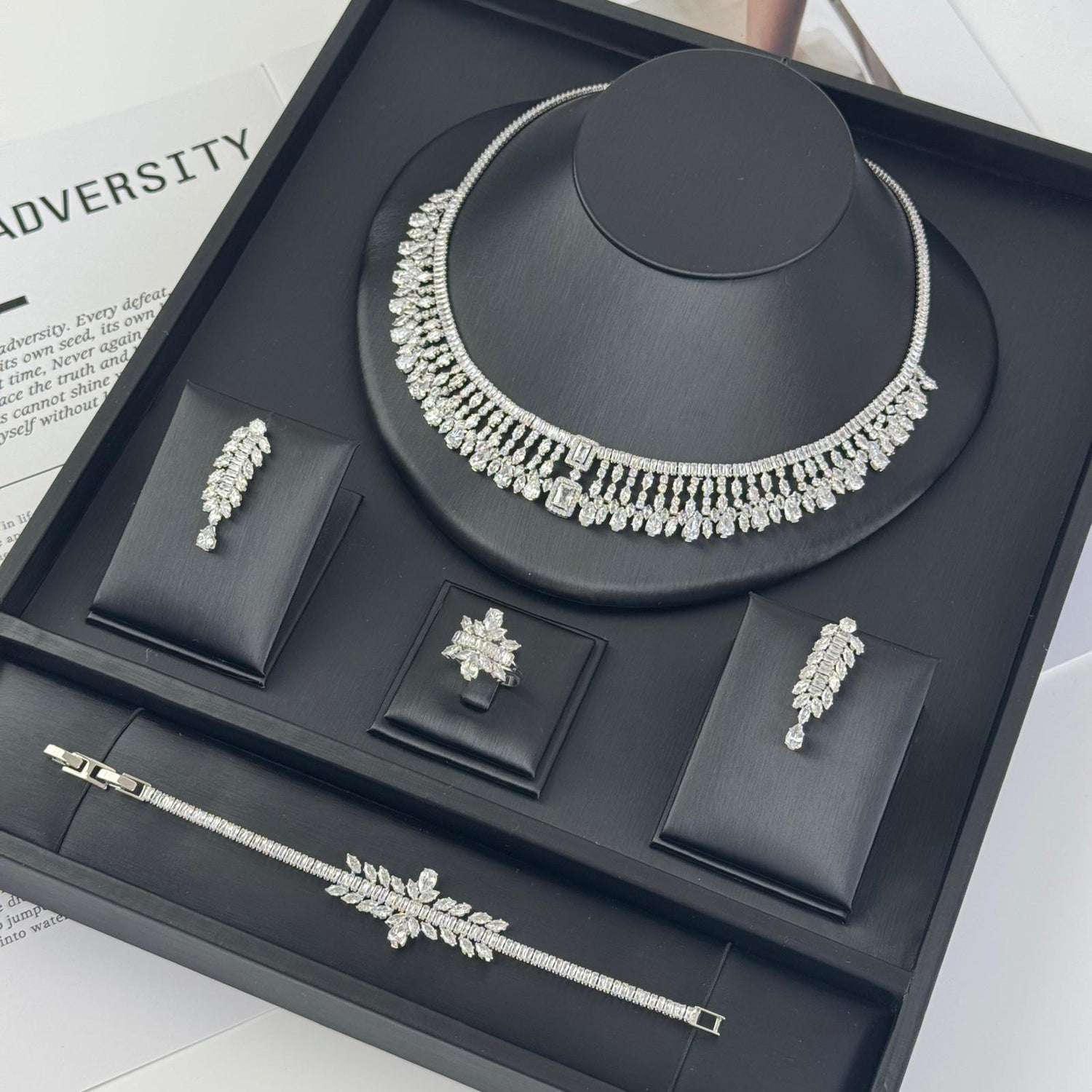 Necklace, earrings, ring, and bracelet set T10218
