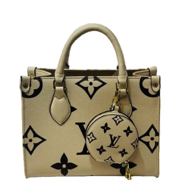 Louis Vuitton handbag, medium size, with a small wallet