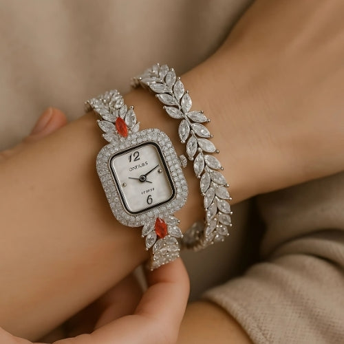 Women's luxury watch, zircon-studded, with a rectangular design and red stones