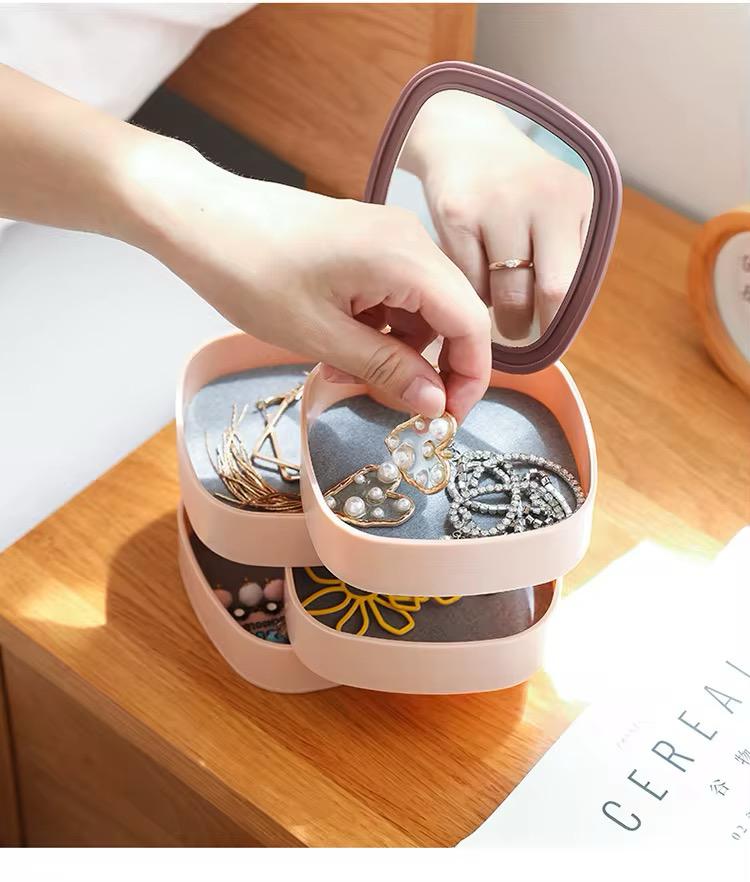 Plastic pink multi-layered accessory box